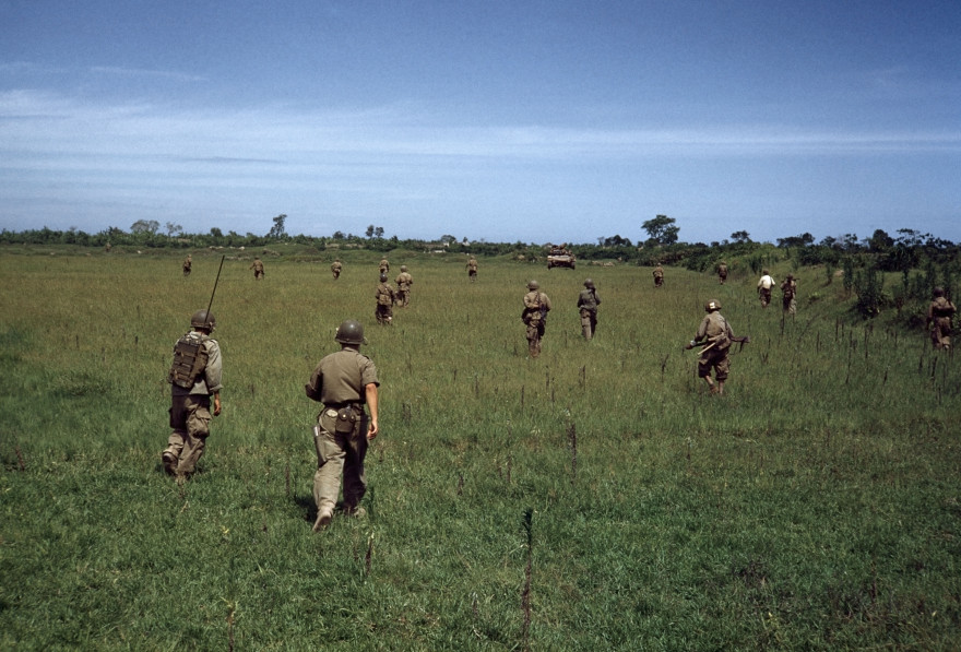 INDOCHINA. May 25, 1954. Vietnamese troops advancing between Namdinh and Thaibinh: one of the last pictures taken by Robert Capa before he stepped on a landmine and died at 14.55.
