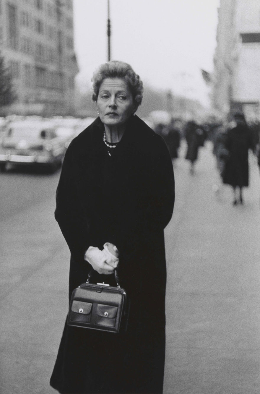MONROWE - Woman with white gloves and a pocket book, N.Y.C. 1956 © The Estate of Diane Arbus, LLC. All Rights Reserved