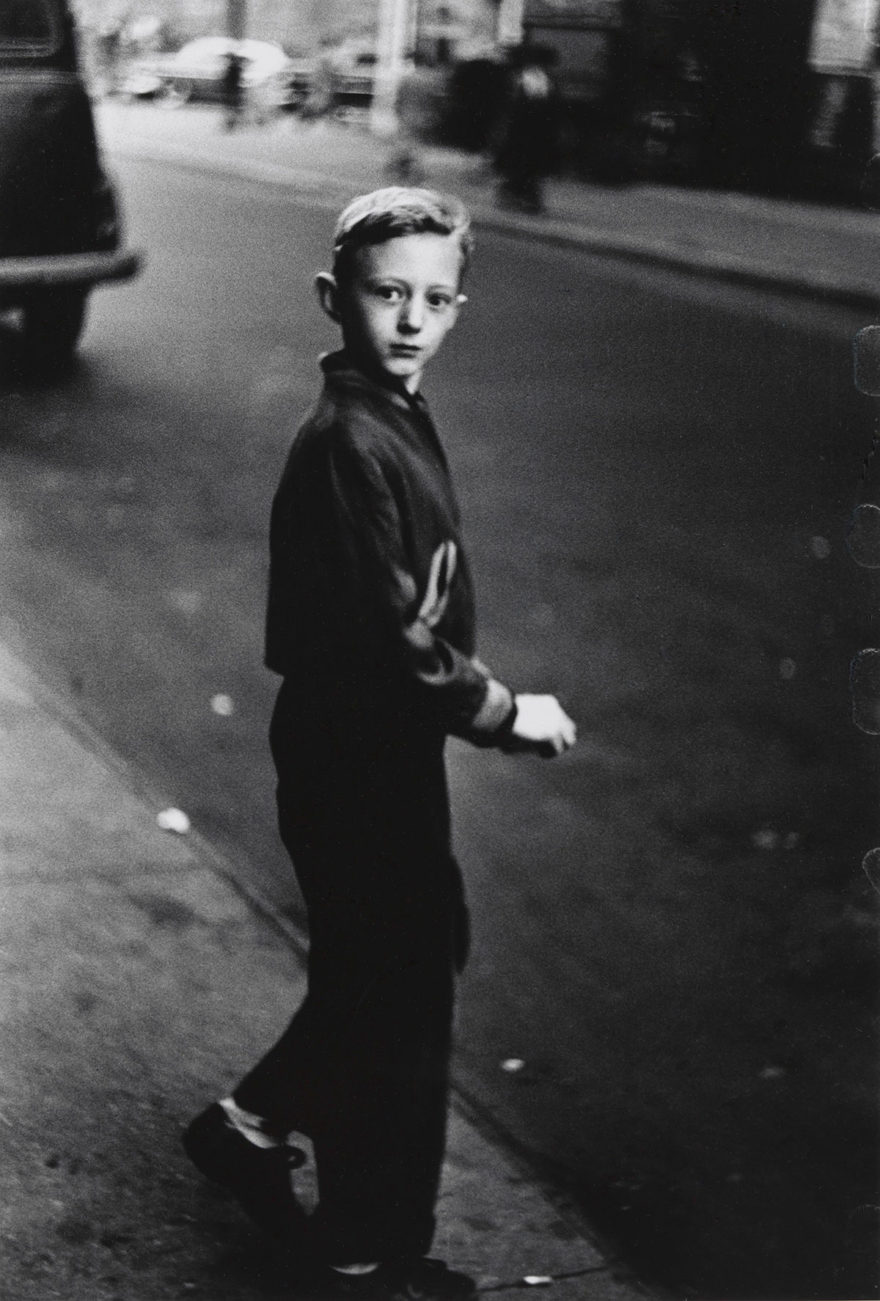 MONROWE - Boy stepping off the curb, N.Y.C. 1957–58 © The Estate of Diane Arbus, LLC. All Rights Reserved