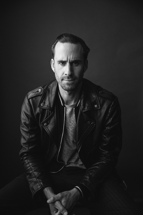 Photo of Actor Joseph Fiennes, from Handmaid's Tale photographed in studio in black and white. 