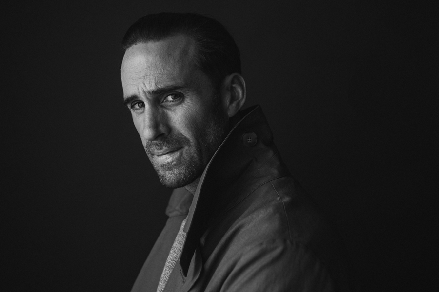 Photo of Actor Joseph Fiennes, from Handmaid's Tale photographed in studio in black and white. Wearing APC