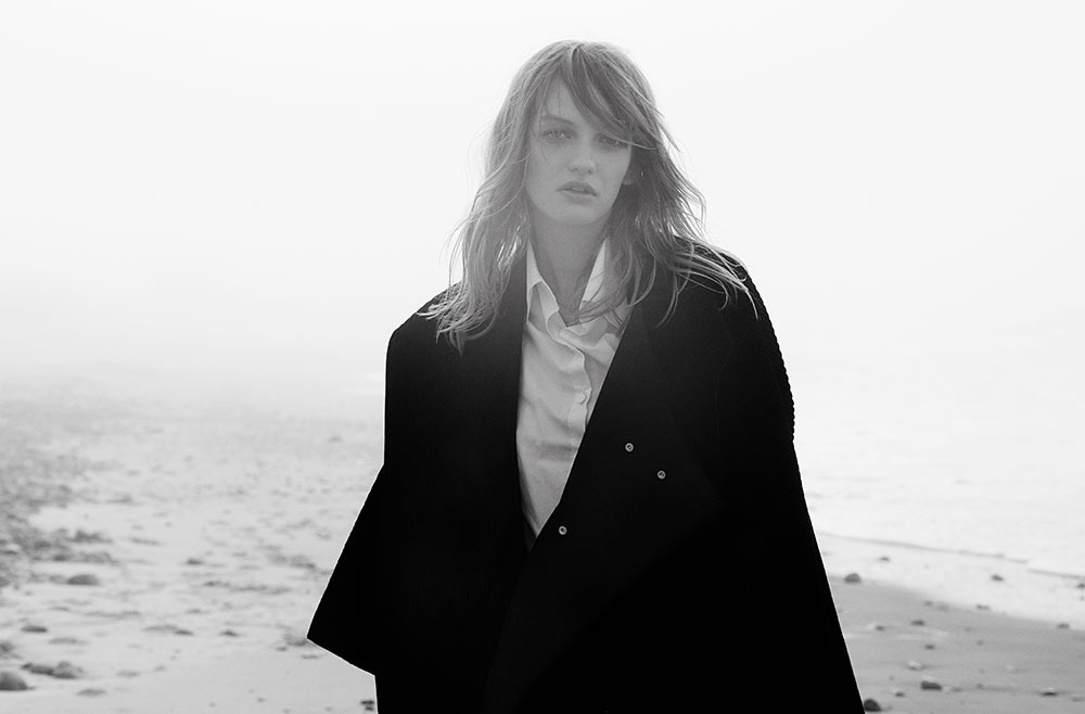 Black and white photograph by photographer Vera Comploj for MONROWE Magazine. Oversized Button-Up Shirt and Wool Coat by Daniel Gregory Natale
