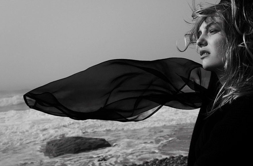 Black and white photograph by photographer Vera Comploj for MONROWE Magazine. Black Knit Blouse by Sacai