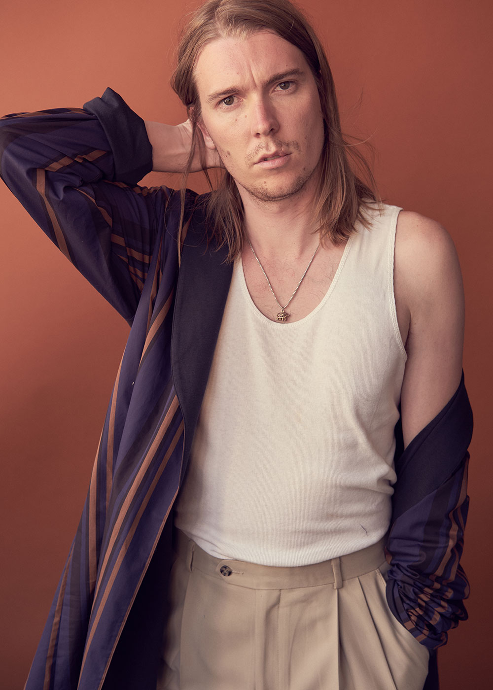 Colored photo of musician Alex Cameron by JackO’Connor for MONROWE Magazine