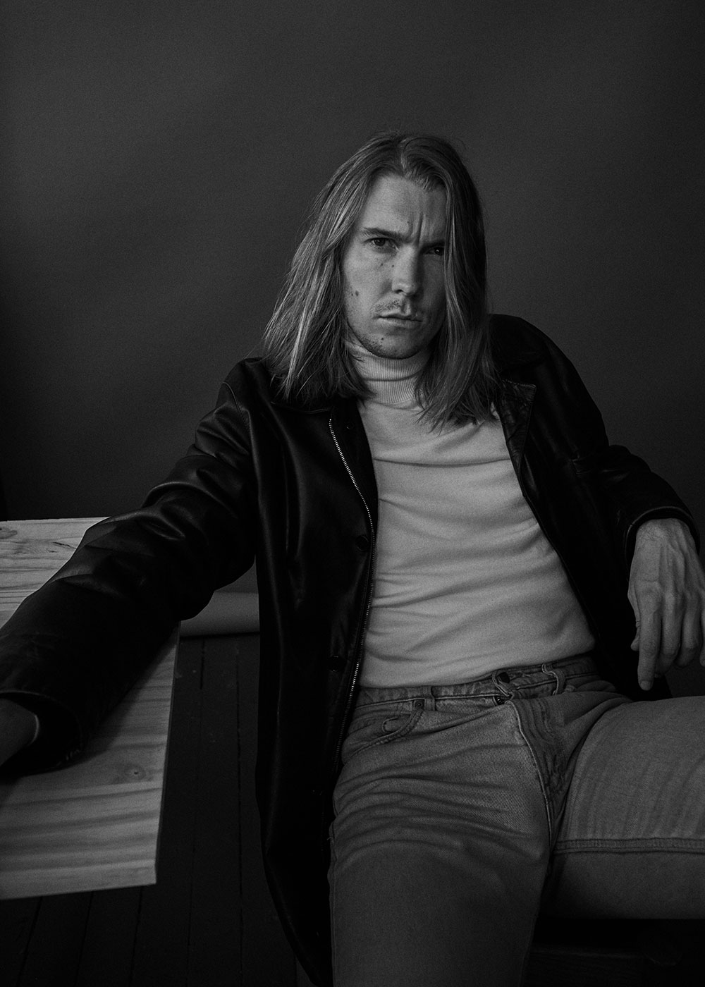 Black and white photo of Alex Cameron by JackO’Connor for MONROWE Magazine