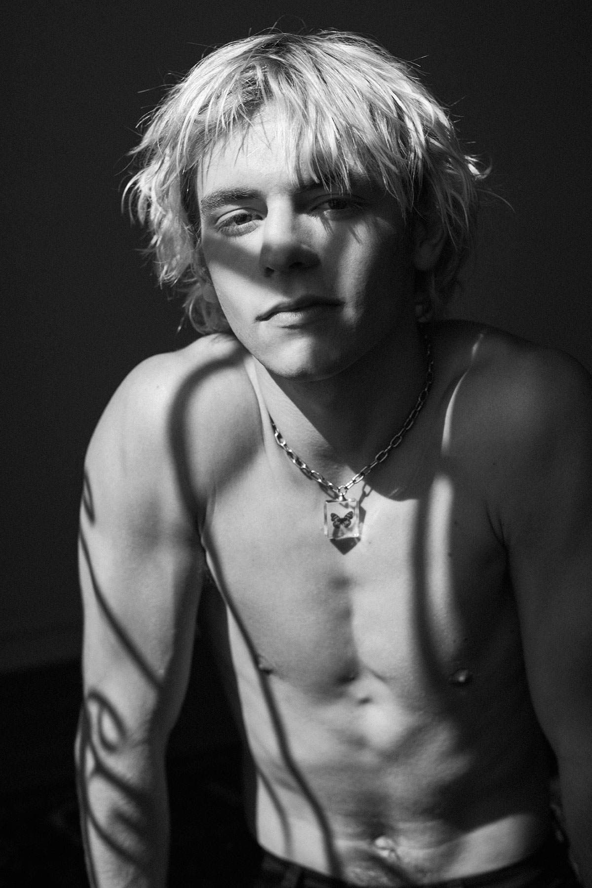 Black and white photo of talent Ross Lynch by Theo Gosselin styled by Sean Knight for MONROWE Magazine