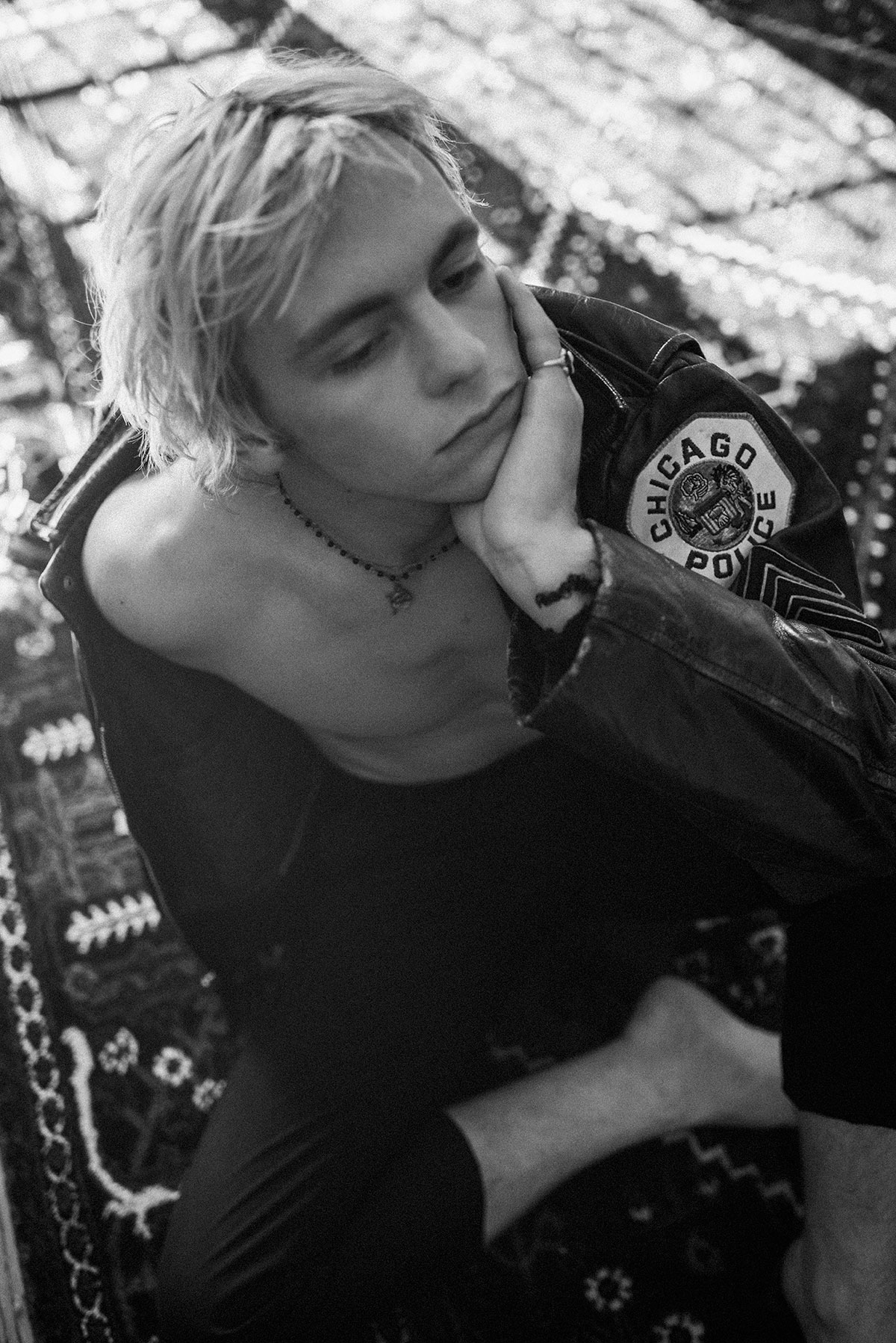 Black and white photo of talent Ross Lynch by Theo Gosselin styled by Sean Knight for MONROWE Magazine